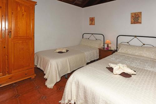 מיטה או מיטות בחדר ב-Casa Antonia