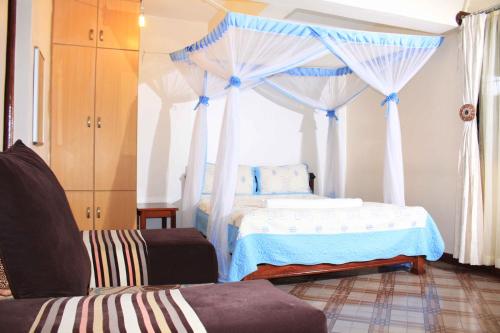 Postel nebo postele na pokoji v ubytování Hotel Marvin