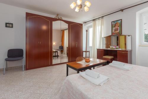 Postel nebo postele na pokoji v ubytování Apartment Macan