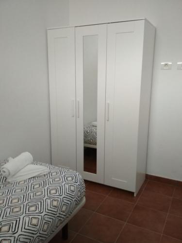 Ένα ή περισσότερα κρεβάτια σε δωμάτιο στο Casita con Barbacoa
