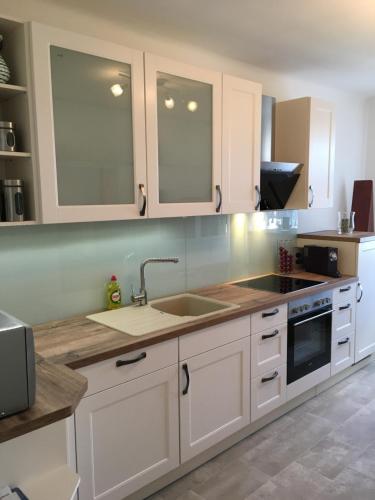 Η κουζίνα ή μικρή κουζίνα στο Ferienhaus Karoline