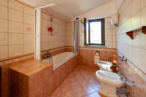 Koupelna v ubytování Azienda Agrituristica Le Terre Di San Leonardo