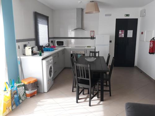 Η κουζίνα ή μικρή κουζίνα στο Apartamentos Basalto