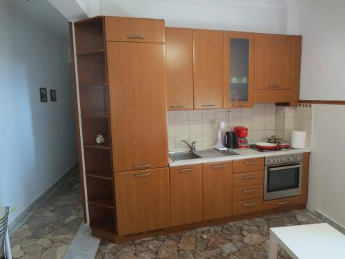 A kitchen or kitchenette at Studio Anna Veria Center