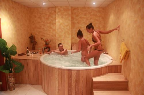 a group of people in a bath tub at Joya Park Hotel in Golden Sands