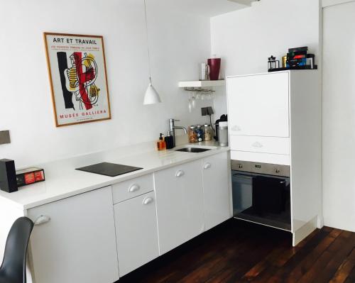 A cozinha ou cozinha compacta de Chez Vous ST HONORÉ