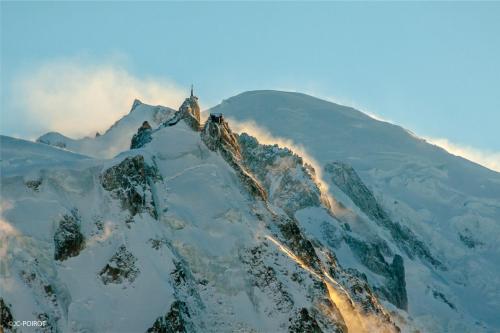 a mountain with snow on top of it at La Folie Douce Hotels Chamonix in Chamonix-Mont-Blanc