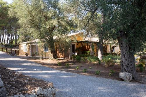 a house on the side of a road at Pelecas Country Club in Pelekas