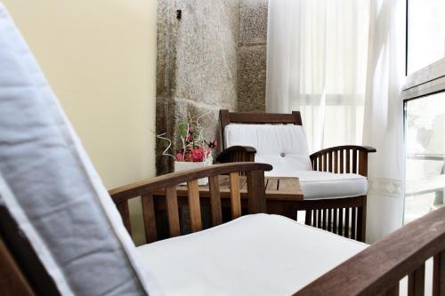 A seating area at Airas Nunes by Pousadas de Compostela