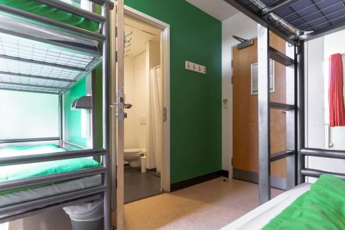 a bathroom with a toilet and a window at YHA London Central in London