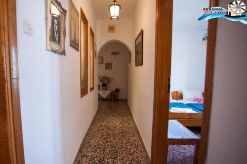 a corridor of a room with a hallway at Pension Mylos in Agios Nikolaos