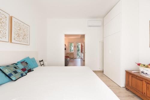 Voodi või voodid majutusasutuse Modern Flat Alberti Arno River Lift & Terraces toas