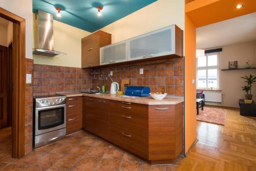 Kjøkken eller kjøkkenkrok på Bright and cosy painters Loft