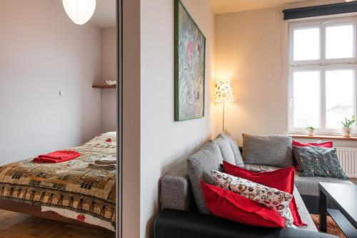 מיטה או מיטות בחדר ב-Bright and cosy painters Loft