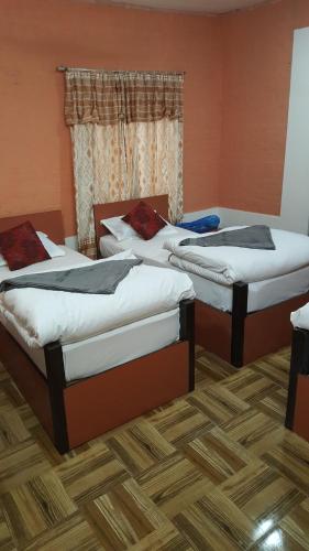 Cama o camas de una habitación en BnB Royal Tourist House