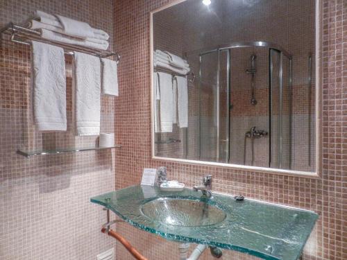 Koupelna v ubytování Residencia Julio