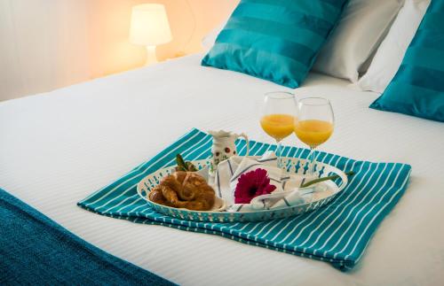 Ein Bett oder Betten in einem Zimmer der Unterkunft Holidays2Malaga Heredia 3 bedroom opposite Malaga Port