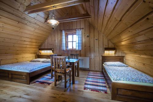Postel nebo postele na pokoji v ubytování Chata Ilčík