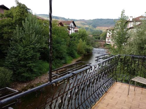 a view of a river from a bridge at Zubitarte in Elizondo