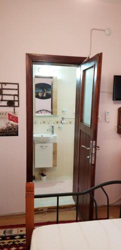 a bathroom with a sink and a mirror at Dardanelles1915 in Canakkale