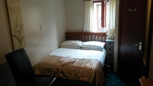 Katil atau katil-katil dalam bilik di Beeches Guest House