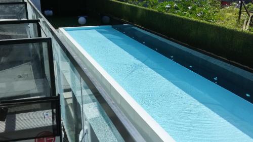 Bazén v ubytování Lumiere Puerto Madero nebo v jeho okolí