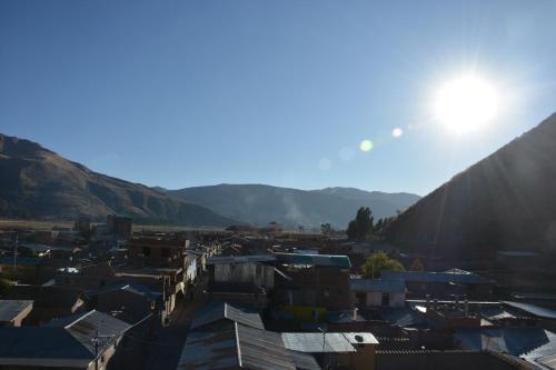 a view of a village with mountains in the background at Hostal Inca in San Pedro