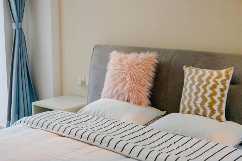 Letto o letti in una camera di Dali lila's house Seaview Guesthouse