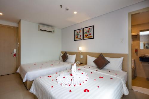 Uma cama ou camas num quarto em Love Hotel