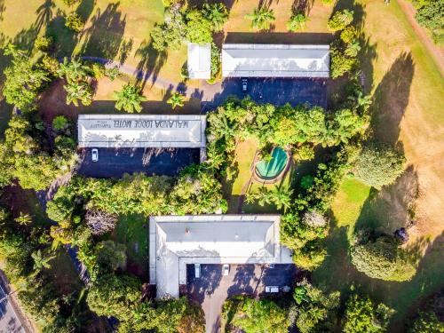 an overhead view of a park with buildings and trees at Malanda Lodge in Malanda