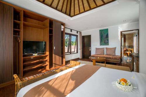 Posezení v ubytování Hartaning House by Pramana Villas