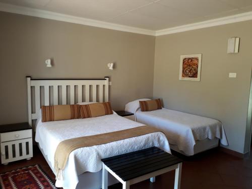 Katil atau katil-katil dalam bilik di Newcastle Country Lodge