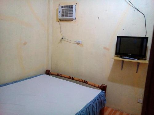 Postel nebo postele na pokoji v ubytování RCJ Pension House