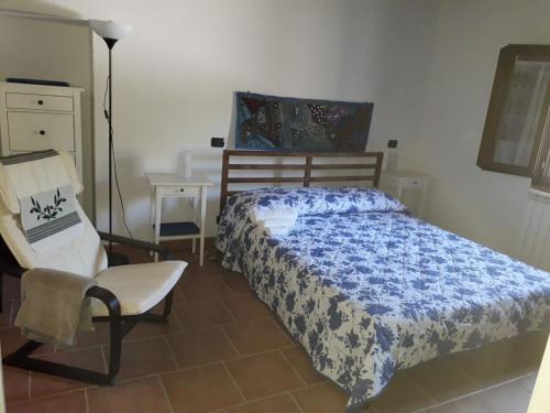 En eller flere senge i et værelse på Casale Arcadia
