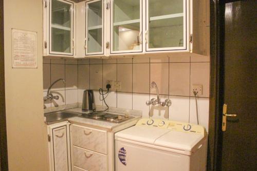 Kuchyň nebo kuchyňský kout v ubytování Tobal Apartments Abha
