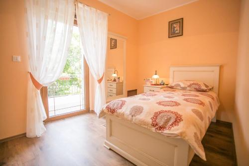 Ένα ή περισσότερα κρεβάτια σε δωμάτιο στο Holiday Home Mendula