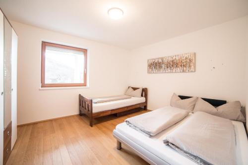 Postel nebo postele na pokoji v ubytování Apartment Eberharter