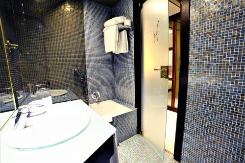 Koupelna v ubytování Hotel Pierre Milano