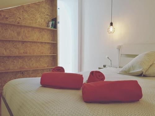 Tempat tidur dalam kamar di The Blue House - Saint Pauls