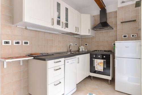 Η κουζίνα ή μικρή κουζίνα στο Urbana Colosseo Boutique Apartment