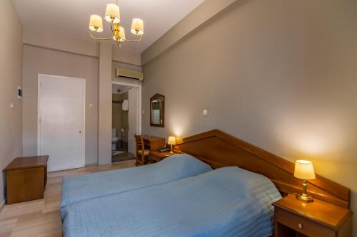 Cama o camas de una habitación en Hotel Halaris