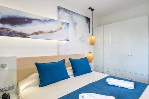 Ένα ή περισσότερα κρεβάτια σε δωμάτιο στο Marinos Beach Hotel