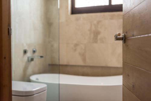 Koupelna v ubytování Hotel Una