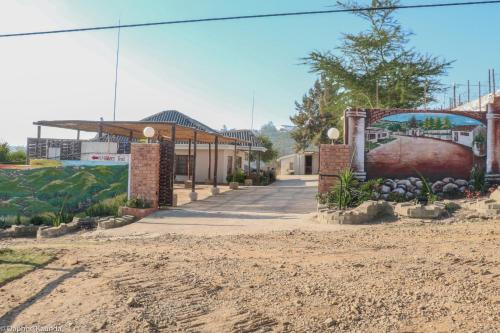 a building with a mural on the side of it at Qabuleka BnB in Nongoma
