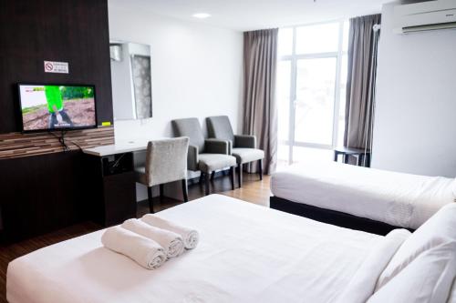 Postel nebo postele na pokoji v ubytování Classy Studio Apartment (KBCP)