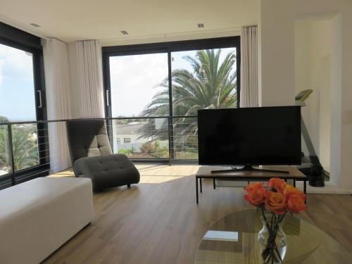 Μια τηλεόραση ή/και κέντρο ψυχαγωγίας στο Cape White Villa
