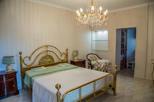 Postel nebo postele na pokoji v ubytování B&b Cortile Aurora