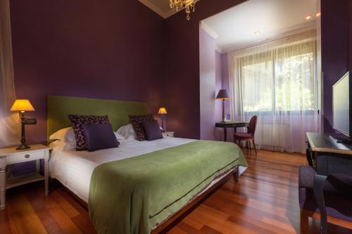 Postel nebo postele na pokoji v ubytování Hotel Fenix