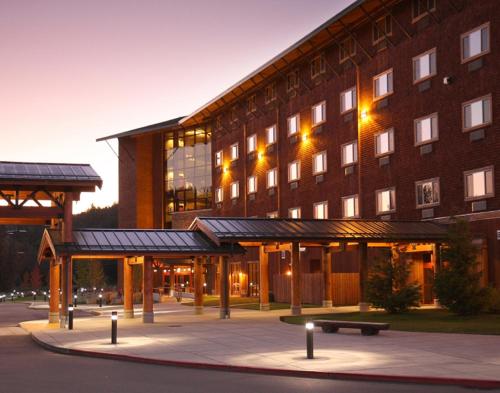 a large building with a bench in front of it at Little Creek Casino Resort in Kamilche