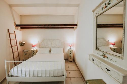 En eller flere senger på et rom på Antonella home